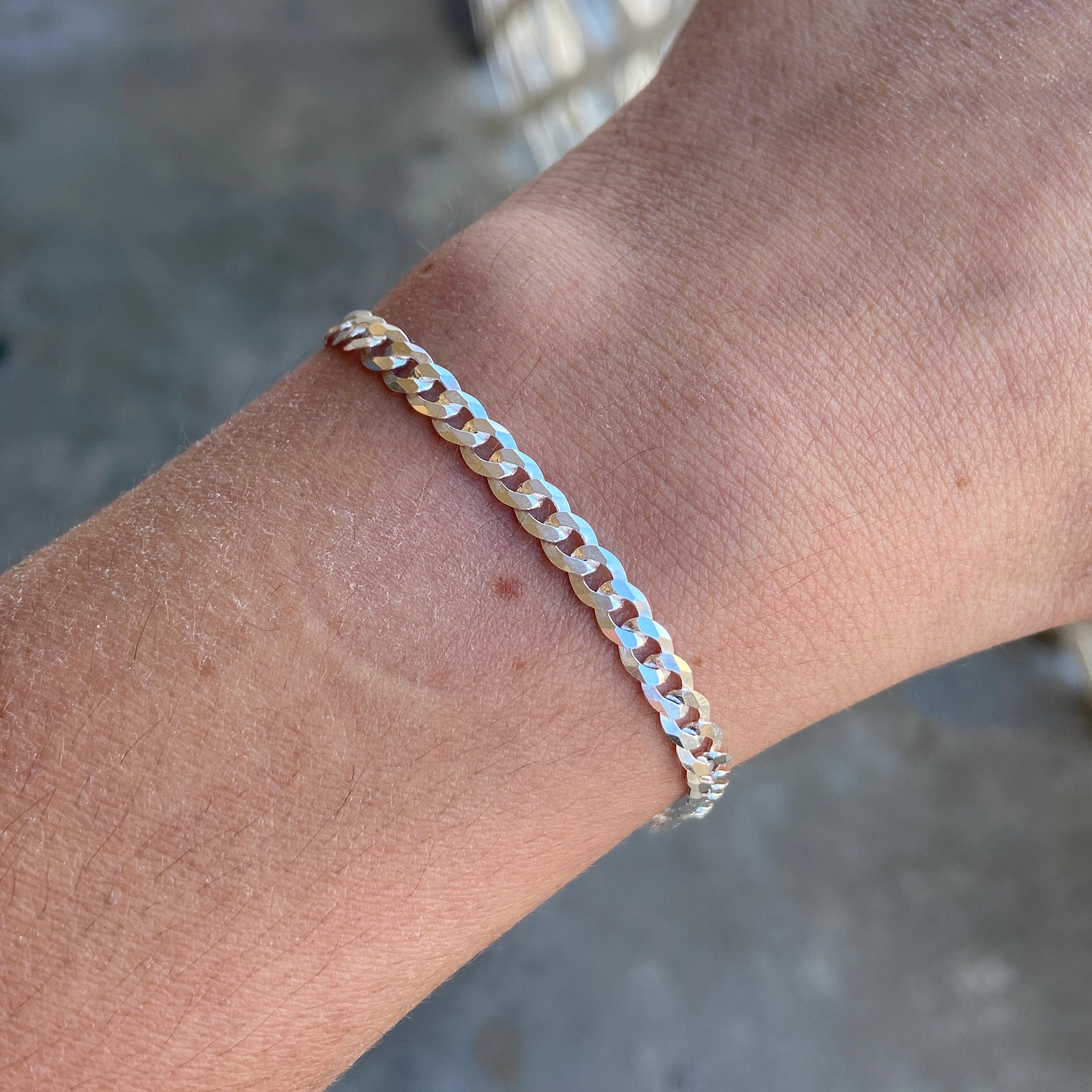 Silver curb 2024 bracelet womens